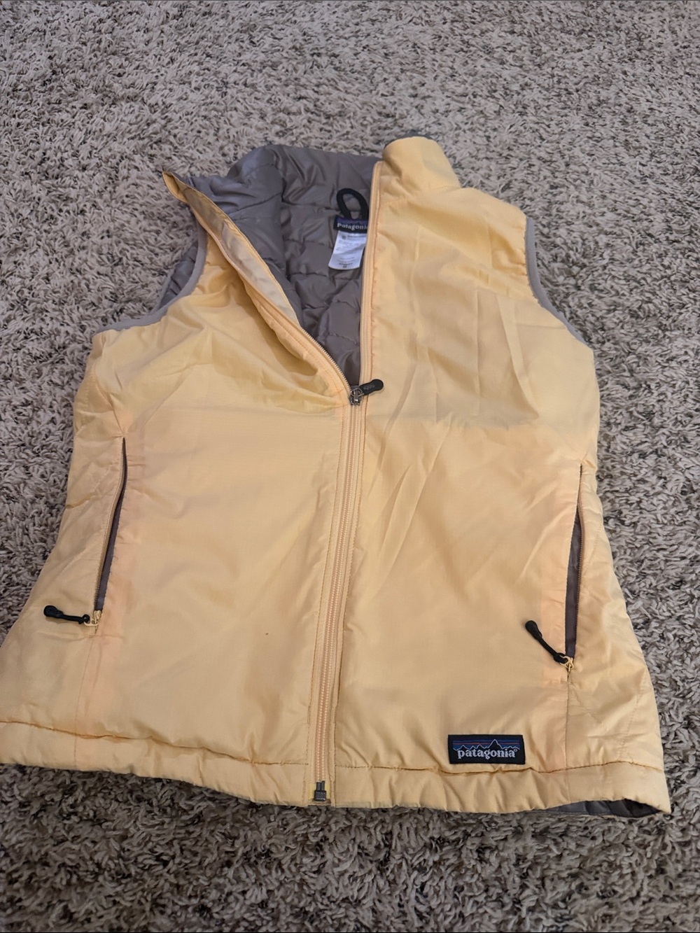 Patagonia Yellow Puffer Vest with Gray Lining